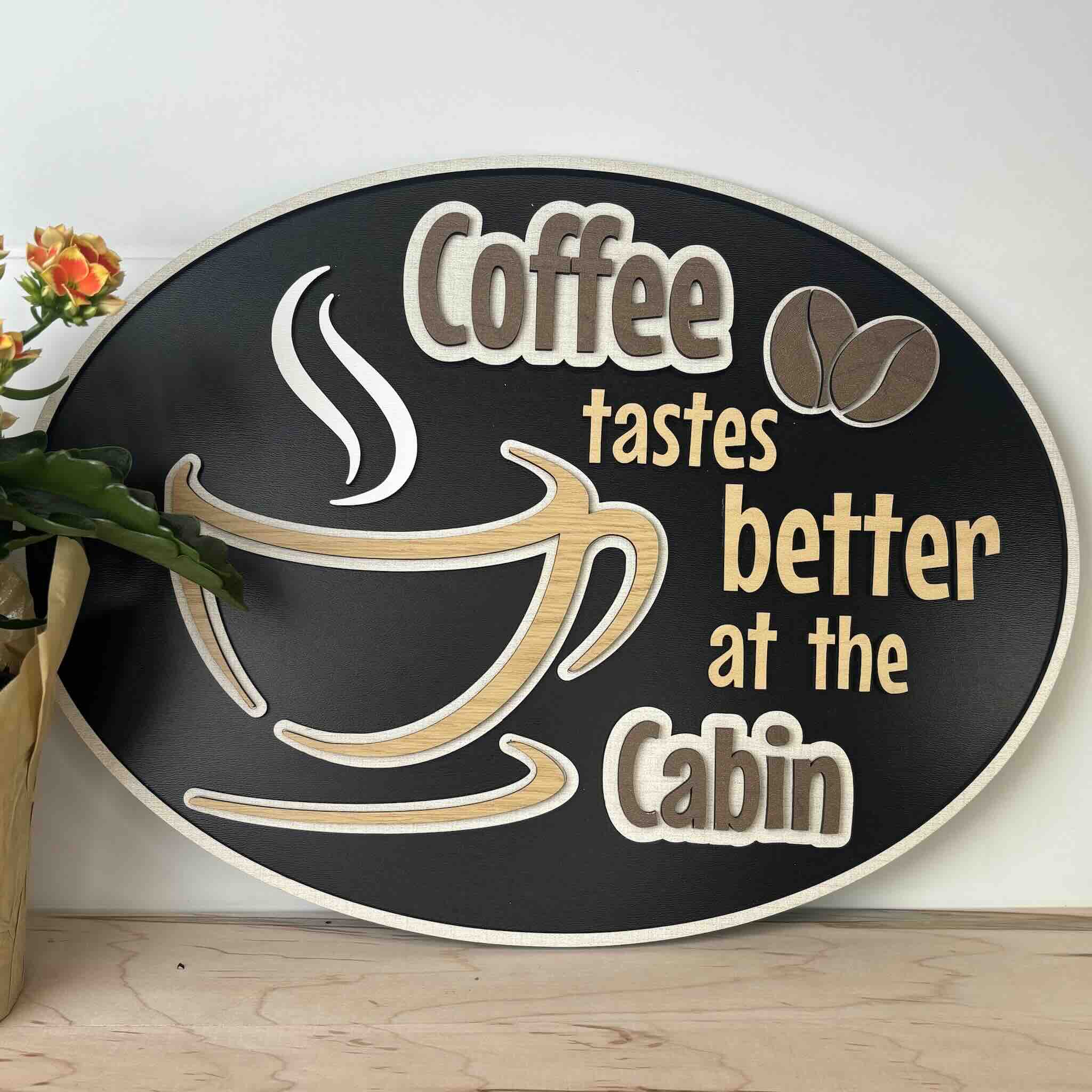Charming wooden sign: 'Coffee tastes better at the cabin.' Perfect for rustic decor.