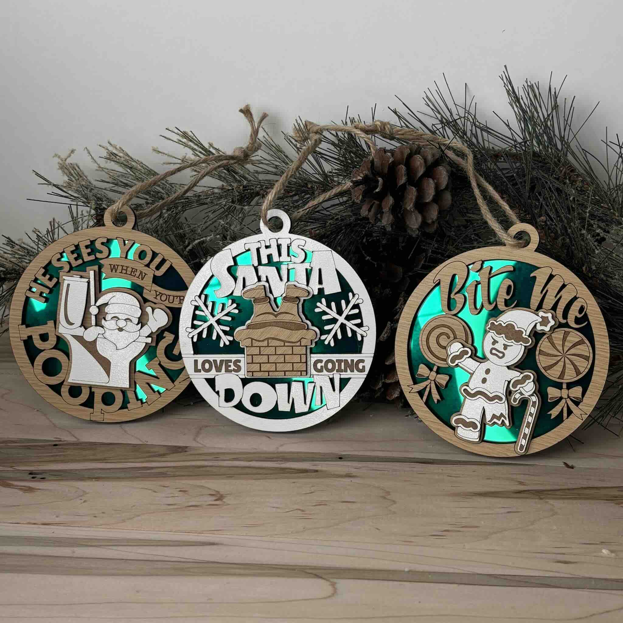 Playful wood and acrylic holiday ornaments featuring Santa and elf themes
